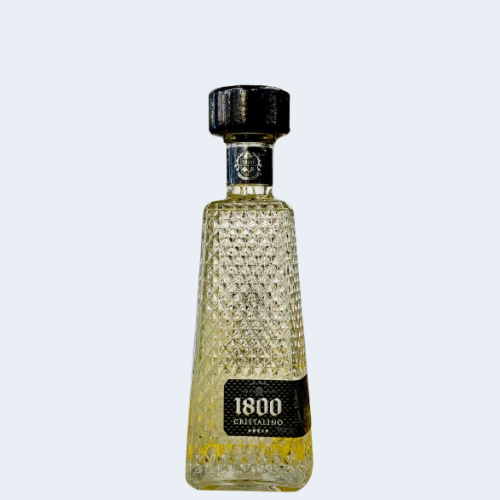 <h4>1800 Cristalino Anejo Tequila</h4>
                                             <div class='border-bottom my-3'></div> 
                                            <table id='alt-table' cellpadding='3' cellspacing='1' border='1' align='center' width='80%'>
                                                <thead id='head-dark'><tr><th>Quantity</th><th>Price/Unit</th></tr></thead>
                                                <tr><td>750ml</td><td class='price'>₹10250</td></tr>
                                            </table>
                                            <b class='text-start'>Description :</b>
                                            <p class='text-justify mt-2'>  
                                                A crystal-clear añejo tequila with deceptive depth, presented in a stunning crystalline bottle. Since releasing the first añejo tequila on the market in 1800 Añejo, 1800 continues to drive innovation with this beautiful contradiction of a spirit. 1800 Cristalino is aged in both American and French oak barrels for 16 months, after which the liquid is married together and finished in Port Wine casks for an additional 6 months. It is then meticulously filtered via a unique process that adds smoothness without sacrificing taste.
                                            </p>